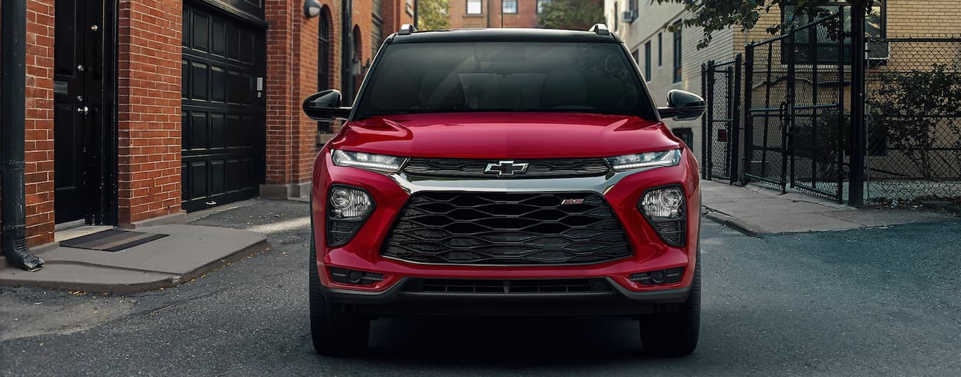 A red 2022 Chevy Trailblazer RS is shown from the front parked after leaving a used Chevy dealer.