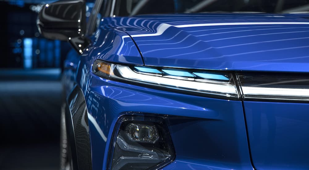 A close up shows the passenger side headlight on a 2024 Chevy Silverado EV RST.