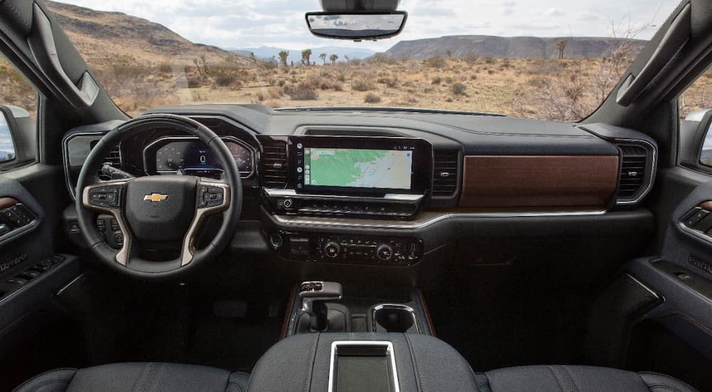 The interior of a 2023 Chevy Silverado 1500 High Country is shown from above the center console.